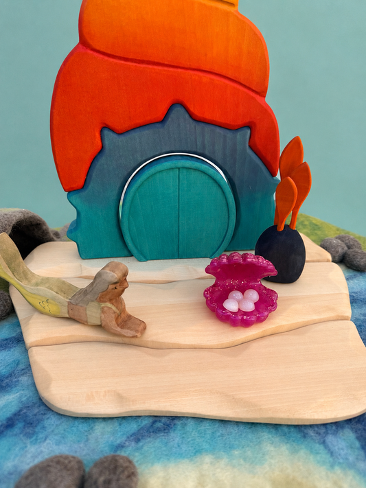 Shell with 4 pearls